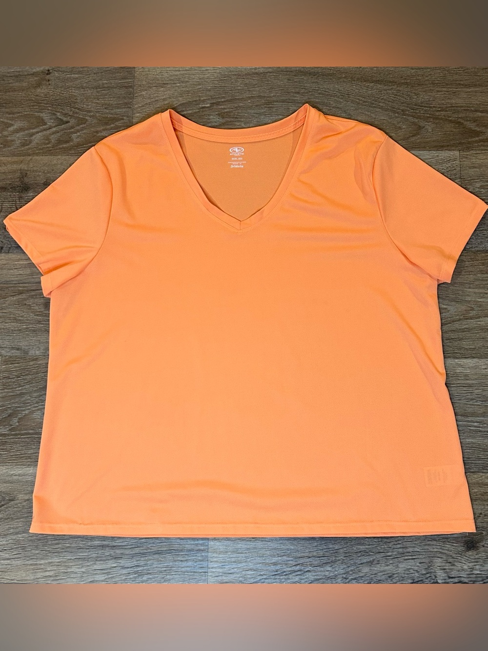 Orange V-Neck DriWorks Athletic Activewear Shirt
Women’s Size XXXL (3XL 22)